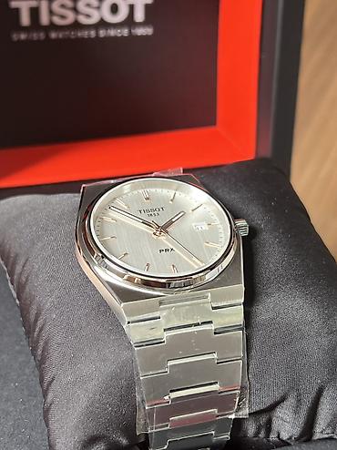 винтажное: Tissot PRX — швейцарские кварцевые часы с интегрированным стальным — 8