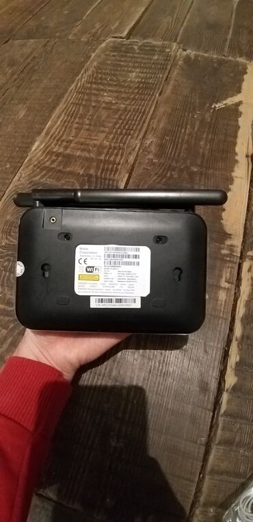 4 portlu modem: Salam Nokia madem optik gpon satılır 1 ildi işlənib təzədən heç
