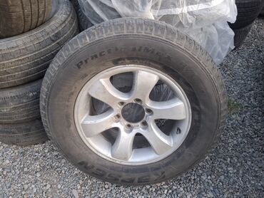 corolla runx: Дөңгөлөктөр монтажда 265 / 65 / R 17, Жай, Колдонулган, Камдык, Жол тандабастар (АТ/МТ), Куйма, тешиктери - 6