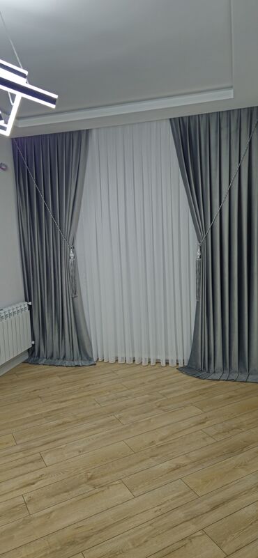 Parçalar: Ağ rəngli, nazik, şəffaf parçadır. Üzərində həndəsi naxışlar var — 21