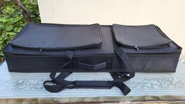 Futlyarlar, çexollar: Korg klaviatura daşımaq üçün nəzərdə tutulmuş bu qara rəngli çanta — 8