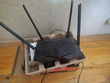 Tenda vifi modem satılır çox az istifade olunub köçlə bağlı təcili
