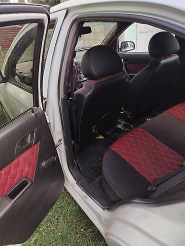 santafe 2010: Chevrolet Aveo: 1.4 l | 2010 il 263000 km Sedan — 10