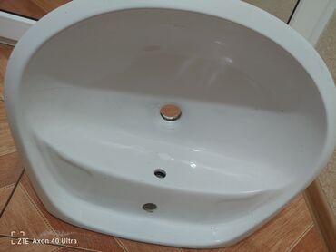 Çanaqlar, tülpanlar: Tulpan soldan saga eni 23.5 sm qarsisinda dayananda 19.6 sm Whatsapp — 3