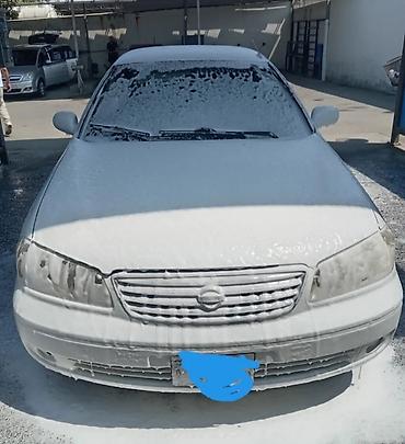 4 göz maşın: Nissan Sunny: 1.6 l | 2004 il Sedan — 5