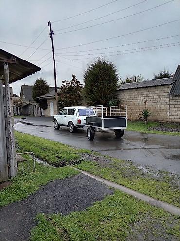 dort tekerlekli motor: Qoşqular – möhkəm metal karkas və taxta döşəmə ilə. Xüsusiyyətlər: - — 8