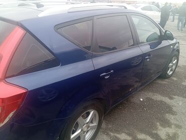 Kia: Kia Cee’d SW (universal), mavi rəng. - Geniş və funksional kuzov — 4