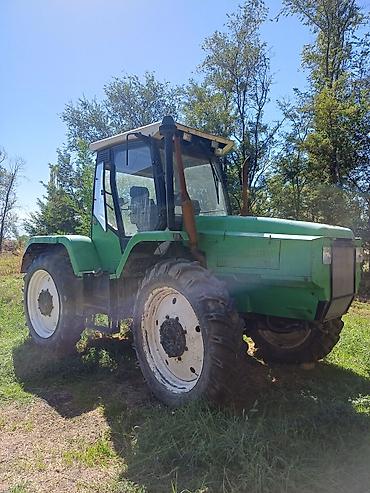 Другие тракторы: Колёсный трактор с кабиной Основные характеристики: - Полностью — 7