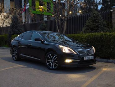 меняю дом на авто: Элегантный черный седан Hyundai Grandeur, отличающийся изысканным