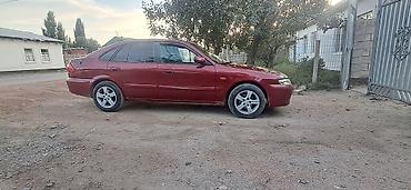 помпа на мазду: Mazda 626: 1999 г., 2 л, Механика, Бензин, Седан — 3