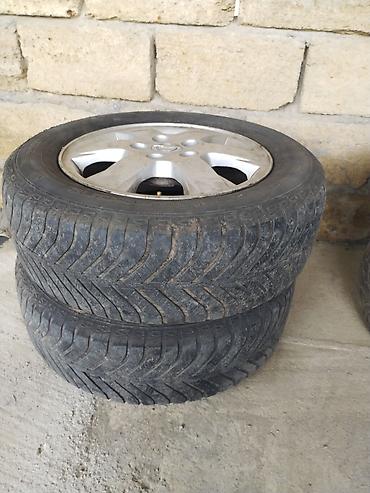 masin rolu: OPEL UCUN 15 LIK DIK TEKER. Satılır: 4 ədəd disklə birlikdə təkər — 2