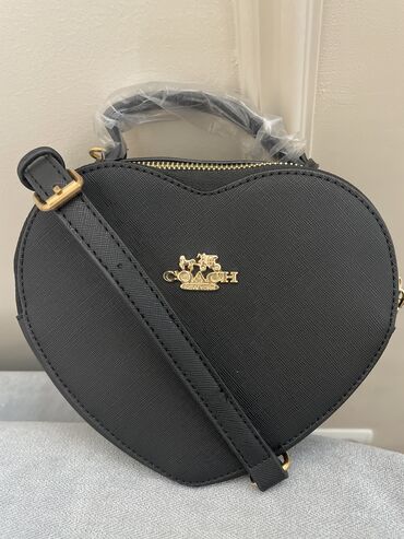 сумка юникло: Продаю новую сумочку. Черная с двумя разделами