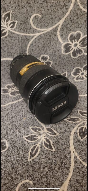 su filtir: Obyektiv NIKON 24-70mm. Cox az islenib, yeni kimidir. Yenisi 3500
