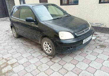 Honda: Honda Logo: 2001 г., 1.3 л, Автомат, Бензин, Купе