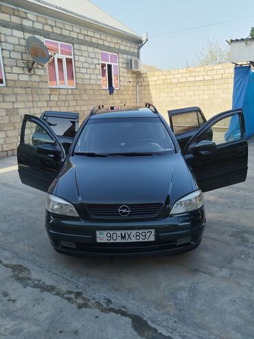 Opel: Opel Astra Caravan (universal) – tünd yaşıl rəng • Kuzov: universal — 1