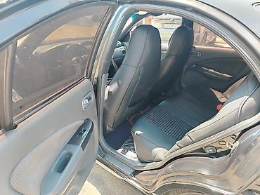 Транспорт: Nissan Sunny: 1.6 л | 2008 г. Седан — 1