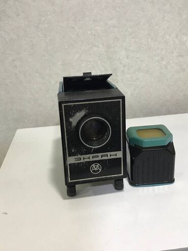 Фотоаппараты: Компактный проектор "Экран" для просмотра слайдов. Легкий и простой в