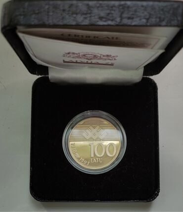 Монеты: Продам золотую монету 75 лет Латвии 5000 за грамм