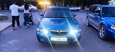 машина посат: Mazda 626: 1998 г., 1.8 л, Механика, Газ, Седан — 10
