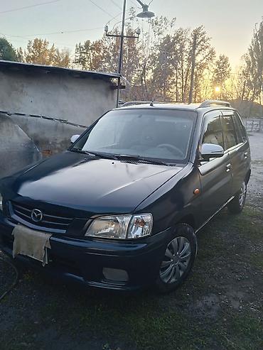 дом в колесах: Mazda Demio: 2000 г., 1.3 л, Механика, Бензин, Универсал — 4