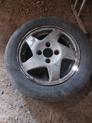 Транспорт: Колесо в сборе: шина + литой диск - Шина: Bridgestone Blizzak Revo — 1