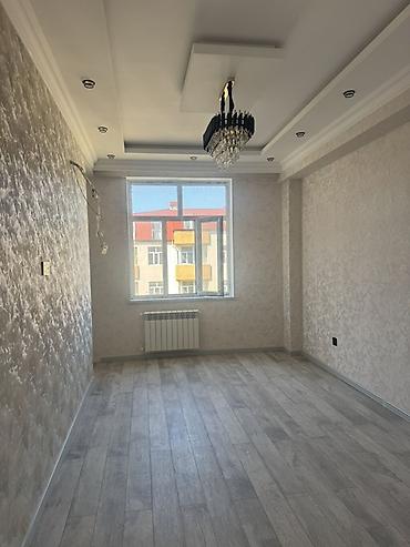xirdalan residence: Satılır 2 otaqlı - Geniş, işıqlı otaq: Laminat döşəmə, dekorativ — 2