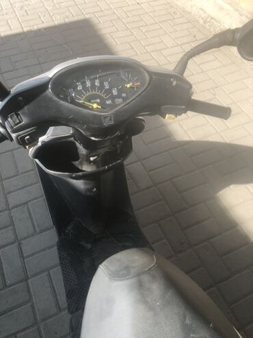 камера для мотоцикла: Скутер Honda, at-62 удобный и практичный для городских поездок