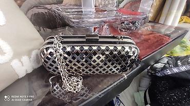 Aksesuarlar: Gümüşü-qara naxışlı qadın axşam çantası (clutch) 50 manata alinib — 1