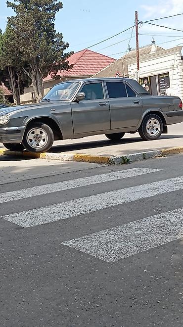 volga 2110: GAZ Volga 31105 sedan - Kuzov: 4 qapılı sedan, tünd boz rəng, xrom ön — 6