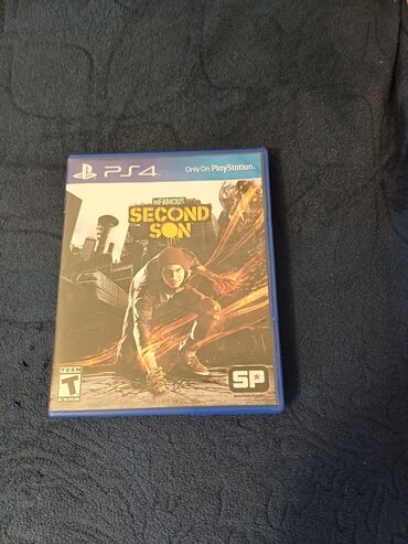 irşad ps4: Ps4 üçün infamous second son oyun az işlenib diskde cızıq bele yoxdur