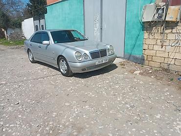 bmw x5 e53: Mercedes-Benz E 200: 2 l | 1997 il Sedan — 4