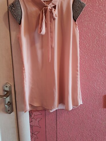 idman geyimleri: Рубашки и блузы