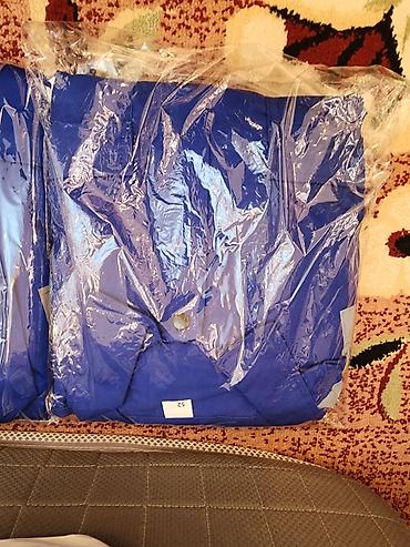 kişi cinsləri: Mavi rəngli kişi kostyumu – paketlənmiş halda. mavi kamizonlar 15 — 6