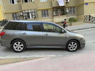 Водный транспорт: Nissan Wingroad – universal kuzovlu, boz rəngli, şəhər və ailə