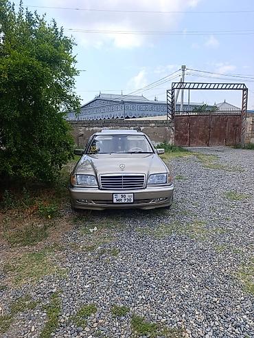tap az 07: Mercedes-Benz C‑Class W202 sedan - Korpus: qızılı rəng, 4 qapı — 1