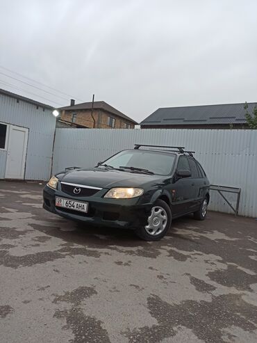 форд мазда: Mazda 323: 2002 г., 1.3 л, Механика, Бензин, Хетчбек