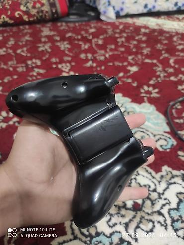 Xbox 360: Игровая консоль Xbox 360 (версия Slim/E) в черном корпусе. - Подходит — 15
