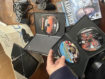 ps1 oyun: PlayStation 2 Slim komplekti Məzmun: - 2 ədəd Sony PlayStation 2 Slim — 4