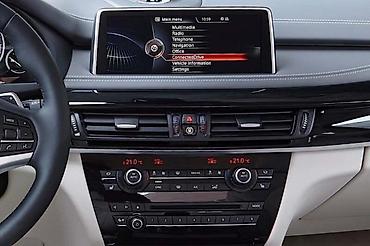 bt holding: RADIO / CD / DVD ZA BMW X5 — 1