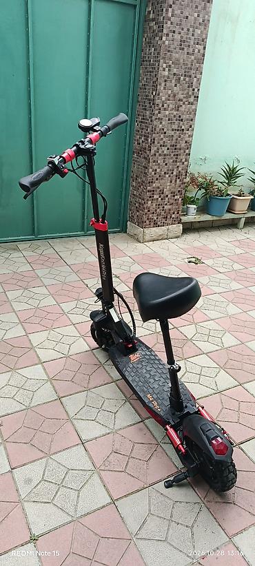 mikrafon şur: **KugooKirin M4 Pro+ elektrik skuter** Cəmi 17 km məsafə qət edib — 3