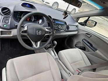 byd e9 1: Honda Insight: 2010 г., 1.3 л, Вариатор, Гибрид, Хэтчбэк — 5