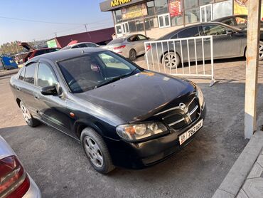 обмен на дом в городе каракол: Черный седан Nissan Almera, модель N16, с серебристыми 14-дюймовыми