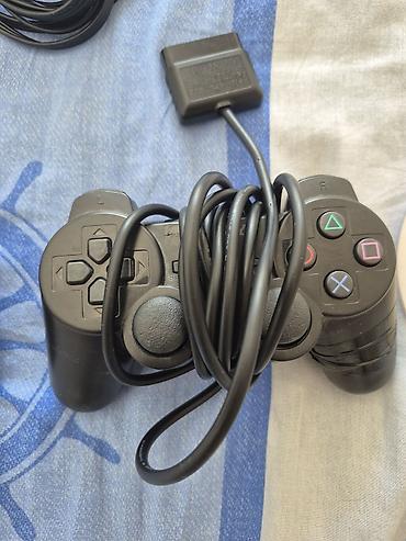 PS2 & PS1 (Sony PlayStation 2 & 1): Sony PlayStation 2 Slim komplekti Paketə daxildir: - PS2 Slim konsolu — 5