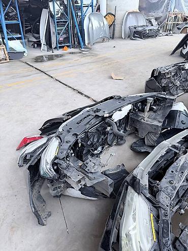 Бампер и комплектующие: Передний бампер в сборе для автомобиля (с интегрированными фарами/ДХО — 10