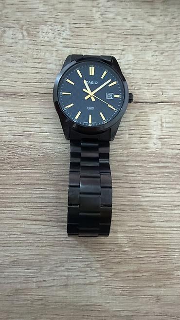 sahmeran qolbaq: Casio qol saatı – klassik analoq dizayn - Korpus və qolbaq: qara — 1