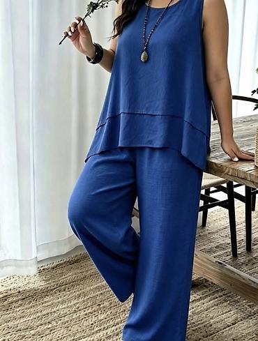 lakovane pantalone: Komplet tunika siroka bez rukava i široke pantalone. - Model — 7