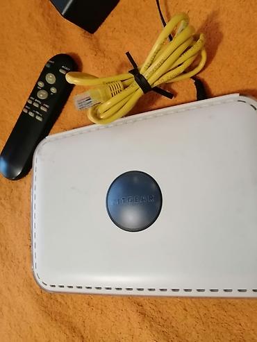 Настольные ПК и комплектующие: NETGEAR 4-portlu şəbəkə marşrutlayıcısı Xüsusiyyətlər: - Ön paneldə — 2