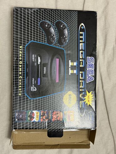 sega mega: Sega mega drive 2. Icerisinde 48 oyun var. Yenidir. Qutusu ile