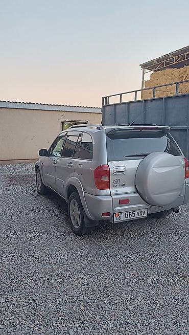 ремонт сколов над лобовым стеклом: Toyota RAV4: 2001 г., Бензин, Кроссовер — 4