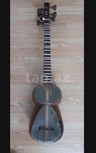 tar qabi: Bahadur tarı.Tam professional alətdi.Super səs temri var.İri — 6